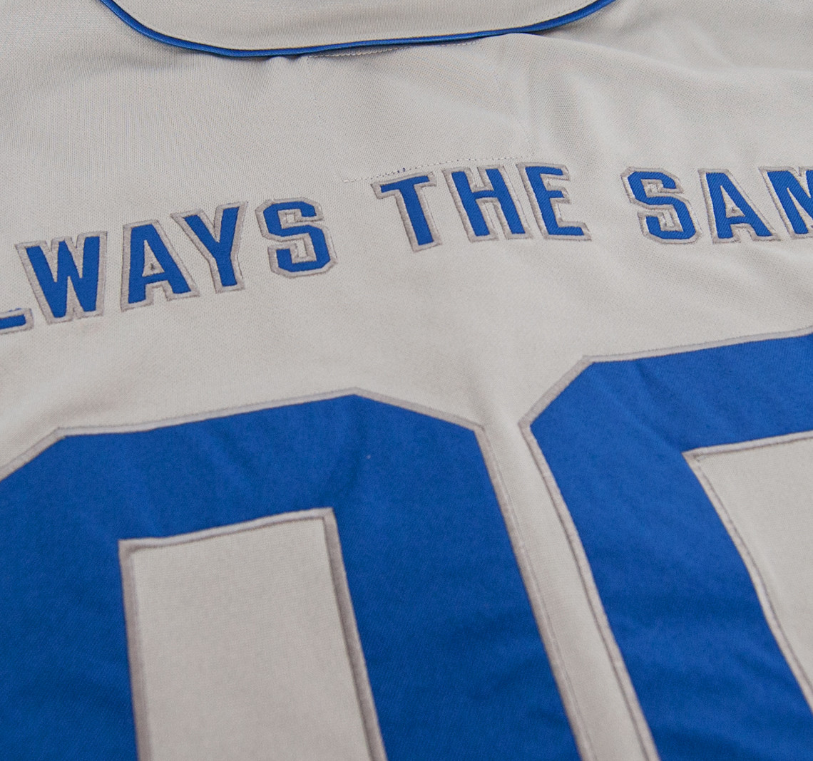 grey and blue baseball jersey