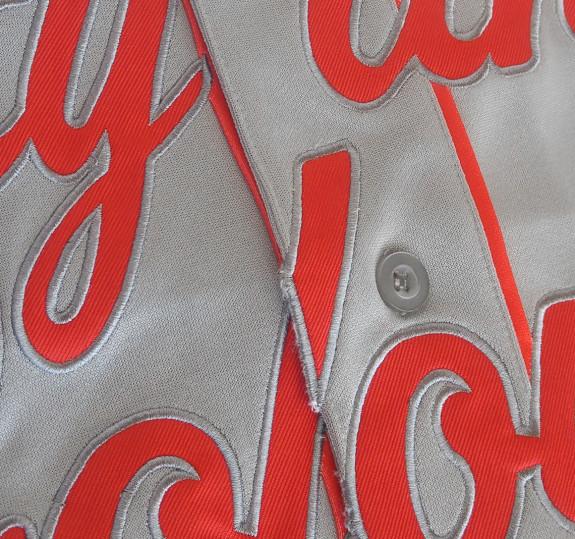 grey and red baseball jersey